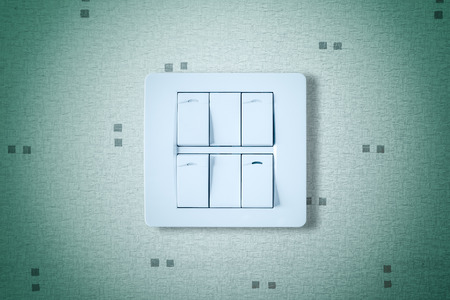 Electronic-light switch on the wallの写真素材