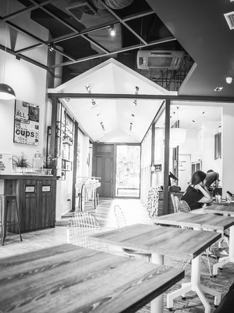Modern restaurant interior with tables and chairのeditorial素材