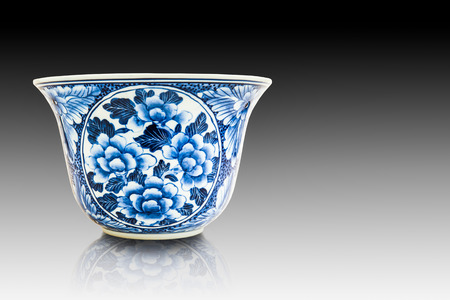 Old chinese flowers pattern style painting on the ceramic bowl isolated on whiteの写真素材