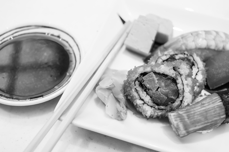 Closeup of California Roll and Sushi with Soy Sauce and Wasabi, Backgroundsの写真素材
