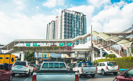 Bridge for people over the road and cars in traffic jam at bangkae junction bangkokのeditorial素材