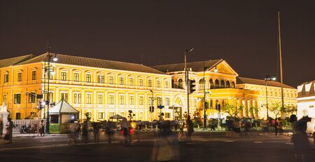 Yellow building at night in Bangkok, November 28, 2017