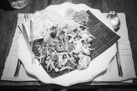 Thai food Pad thai on wood table, Backgroundsの写真素材