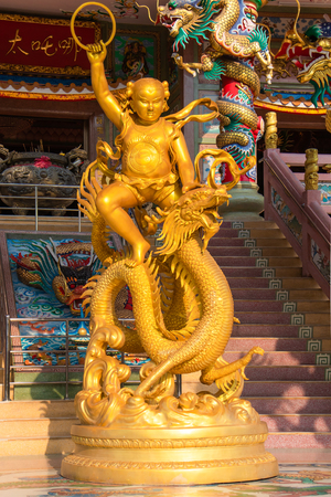 Golden statue Wat Phuttharam chinese temple at Ang Sila Chonburi Thailand, April 16, 2018のeditorial素材