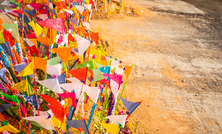 A colorful flags on sandy pagoda in Thai Songkran Festival, Thailand