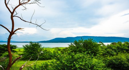 Sky, forest, mountain and reservoir at Lam Takhong reservoir, Nakhon Ratchasima, Thailandの写真素材