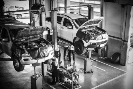 Pickup truck mechanic repairing at Isuzu service station at Putamontorn 5 line Srinakarin road Nakhon Pathom Thailand, January 15, ?2019のeditorial素材
