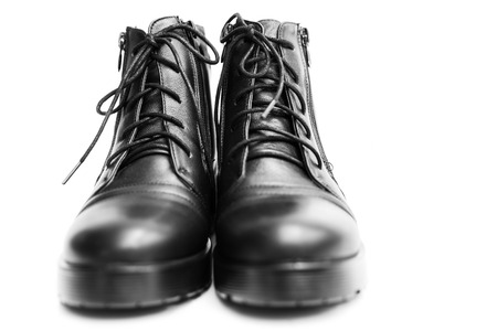 Fashion concept with black boots on white backgroundの写真素材