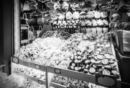 Sale of objects of arts and crafts in souvenir shops in Terminal 21 Department Store at Asoke Montri intersection Sukhumvit road Bangkok Thailand, April 17, 2019のeditorial素材