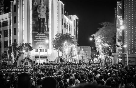 Thai people wear yellow shirts and are waiting for His Majesty King Rama 10 through Ratchadamnoen...