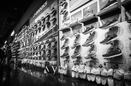 Men's sneakers on the shelves in the department store  at Bangna-Trad road Bangna Bangkok Thailand,...