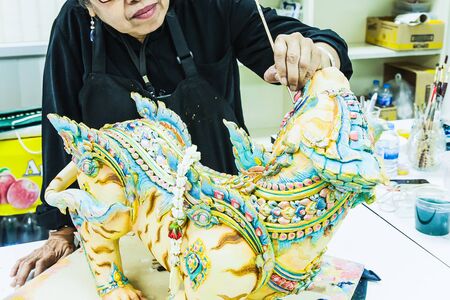Artist painted on animal statues in Thai literature at the Fine Arts Department, Sanam Luang, Bangkok, Thailand, September 14, 2017のeditorial素材