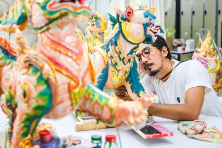 Artist painted on tiger statues in Thai literature at the Fine Arts Department, Sanam Luang, Bangkok, Thailand, September 14, 2017のeditorial素材