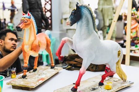Artist painted on horses statues in Thai literature at the Fine Arts Department, Sanam Luang, Bangkok, Thailand, September 14, 2017のeditorial素材