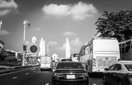 Rush hour - Cars stuck in traffic jam at Democracy monument Ratchadamnoen road Bangkok Thailand