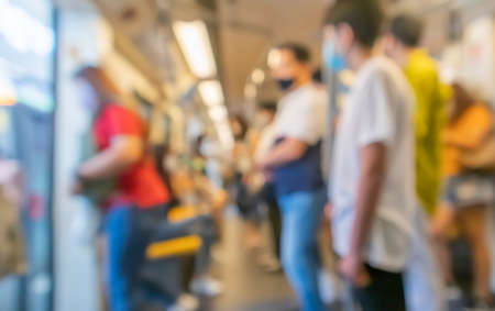 Blurred, People wear mask on the Skytrain, Skytrain is one of the most convenient methods to travel...