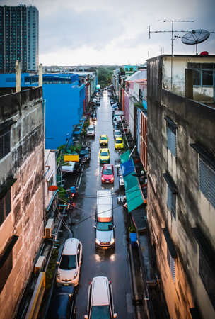 On a raining day, The car runs in the alley on Sukhumvit road Bangchak Phra Khanong Bangkok Thailand, August 28, 2020のeditorial素材
