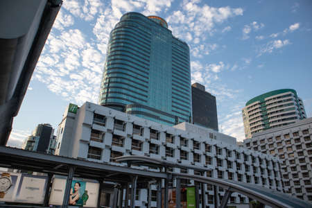 The buildings with clouds and blue sky at Sukhumvit road, Chidlom, Bangkok, Thailand, November 27,...