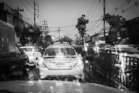 Rush hour after work, Cars stuck and traffic jam in the rain at Rama 4 road Khlong Toei Bangkok Thailand, August 24, 2018のeditorial素材