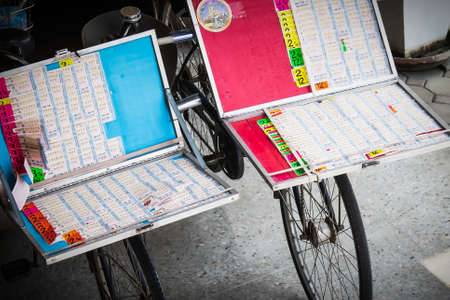 Lottery stalls mounted on bicycles at Putamontorn 5 line Srinakarin road Nakhon Pathom Thailand, September 29, 2018のeditorial素材