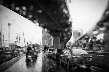 Rush hour after work, Cars stuck and traffic jam in the rain at Sathorn-Kalapapruek road Bangkok Thailand, August 25, 2018のeditorial素材