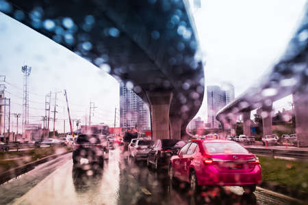 Rush hour after work, Cars stuck and traffic jam in the rain at Sathorn-Kalapapruek road Bangkok Thailand, August 25, 2018のeditorial素材