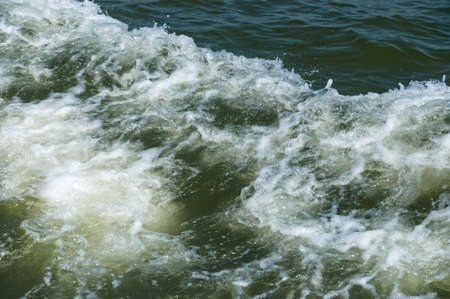 Ripples bubble of the boat on surface of the water, texture backgroundの写真素材