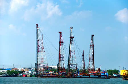 Industrial factory along the Chao Phraya river Samut Prakan Thailand