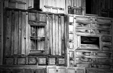 The walls of an old Thai houses with windows, Pattern backgroundの写真素材