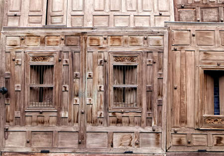 The walls of an old Thai houses with windows, Pattern backgroundの写真素材