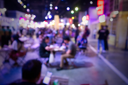 Blurred, People in food street festival at Queen Sirikit National Convention Center Bangkok Thailandの写真素材