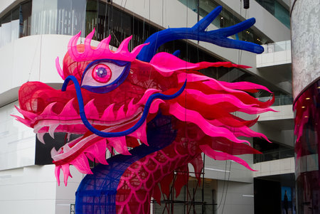 Beautiful red dragon in front of department store in Bangkok Thailandの写真素材