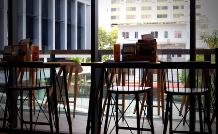 Dining bar counter and chairs in a restaurant Bangkok Thailand, Interior design backgroundの写真素材