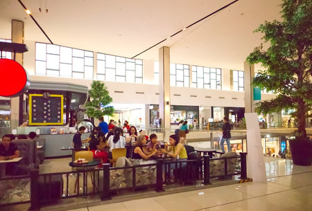 August 12, 2023,  Corner of ice cream and bakery shops and customers eat and drink inside the shop in a department store on Bangna-trad road Bangkok Thailandのeditorial素材