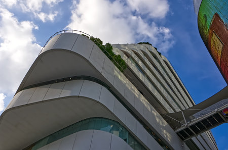 Exterior design, Department Store building with clouds and sky on Sukhumvit road Bangkok Thailandの写真素材