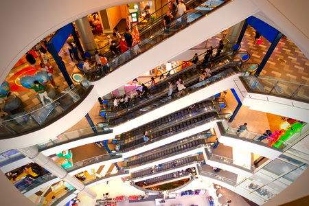 August 17, 2024, Interior design of Terminal 21 Shopping Mall with people on escalator at Asoke Montri intersection Sukhumvit road Bangkok Thailandのeditorial素材