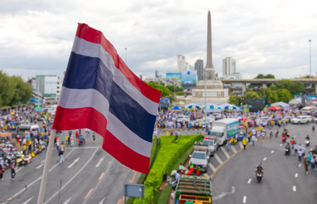 People protest to oust the incompetent prime minister and government at the Victory Monument in Bangkok, Thailandの写真素材