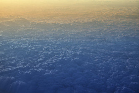 Beautiful fluffy white clouds with sunrise in the morning of a new day, outdoors background