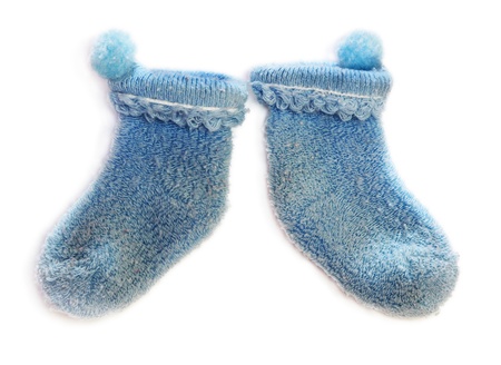 Baby blue socks isolated on white