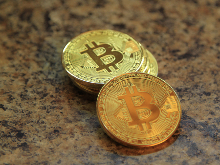 Bitcoin cryptocurrency coins isolated on a granite tableの写真素材