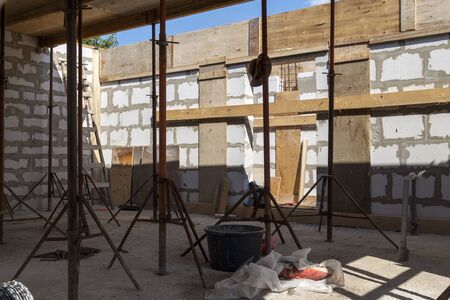 view of the wooden formwork with metal holders, which will be filled with the overlap between the...