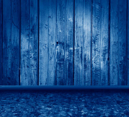 wooden grunge interior toned in trendy Classic Blue color of the Year 2020の写真素材