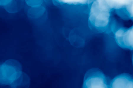 image of summer blur background toned in trendy Classic Blue color of the Year 2020の写真素材