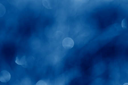 Abstract blurred natural background toned in trendy Classic Blue color of the Year 2020の写真素材