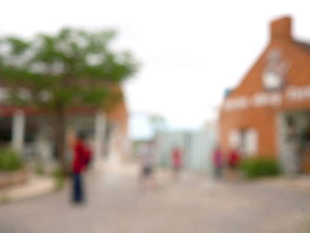 blur open air shopping mall/blur orange brick wall building for use as Backgroundの写真素材