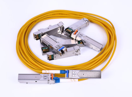 Optic fiber with connector isolated on white background
