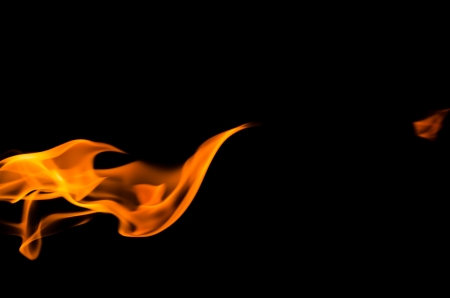 Fire flames on a black backgroundの写真素材