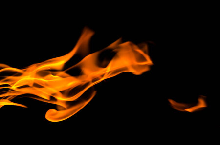 Fire flames on a black backgroundの写真素材