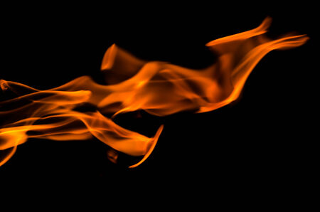 Fire flames on a black backgroundの写真素材