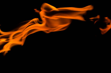 Fire flames on a black backgroundの写真素材